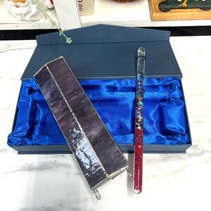 Kaleidoscope with prismatic oil wand in original box